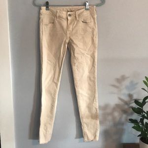 Cream colored skinny jeans